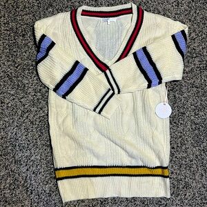 Woman’s More To Come v-neck knit sweater. Size M. With striped pattern.